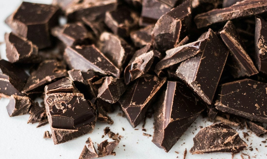 Broken dark chocolate pieces