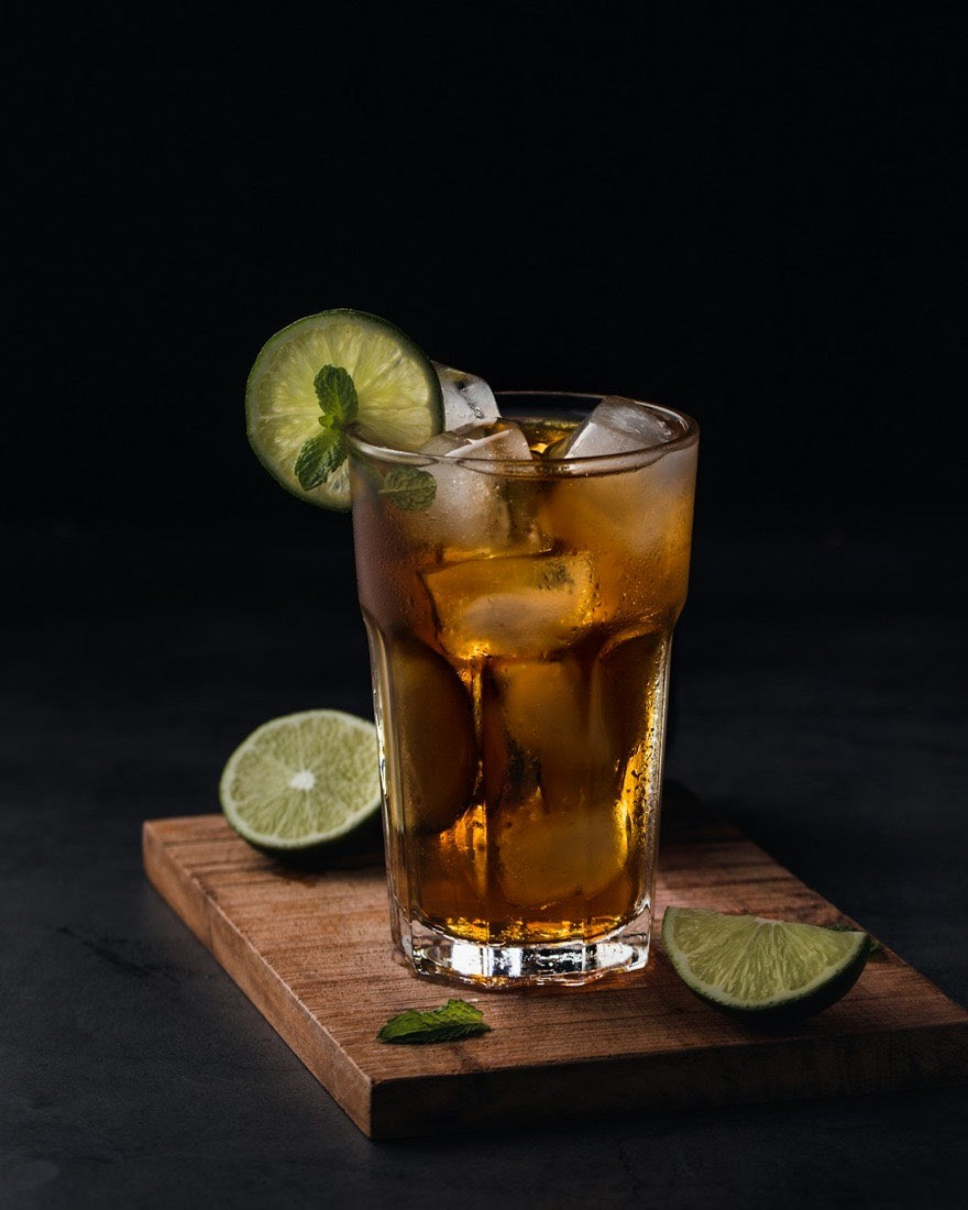 A tall cold drink with lime